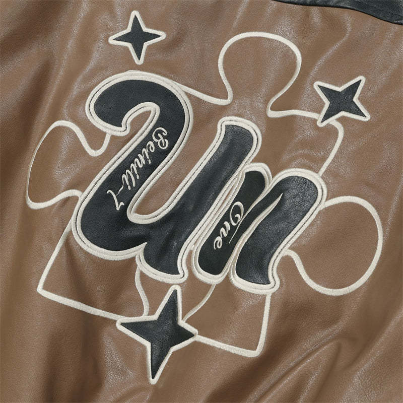 "Understanding" Embroidered Faux Leather Coat