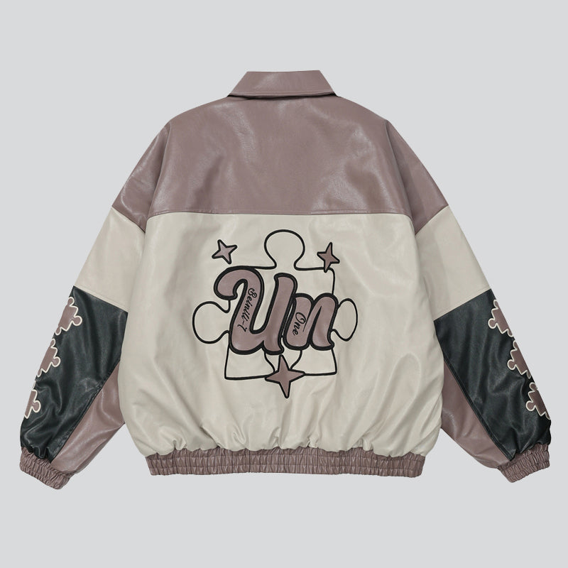 "Understanding" Embroidered Faux Leather Coat