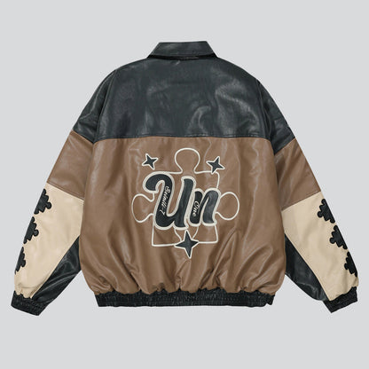 "Understanding" Embroidered Faux Leather Coat