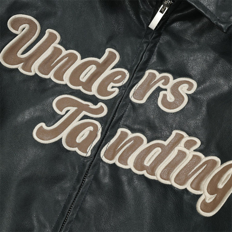 "Understanding" Embroidered Faux Leather Coat